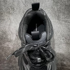 Balenciaga sneakers inside view, black insole with Balenciaga and size label