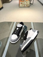 Chanel unisex lace-up sneakers, black-and-white upper with thick rubber sole