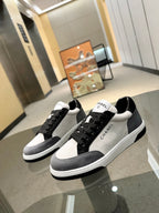 Chanel unisex lace-up sneakers, black suede panels with white toe and heel tabs
