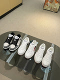 Chanel unisex low-top sneakers set, black and white, lace-up with padded collar