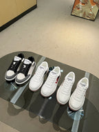 Chanel unisex low-top sneakers set, black and white, lace-up with padded collar