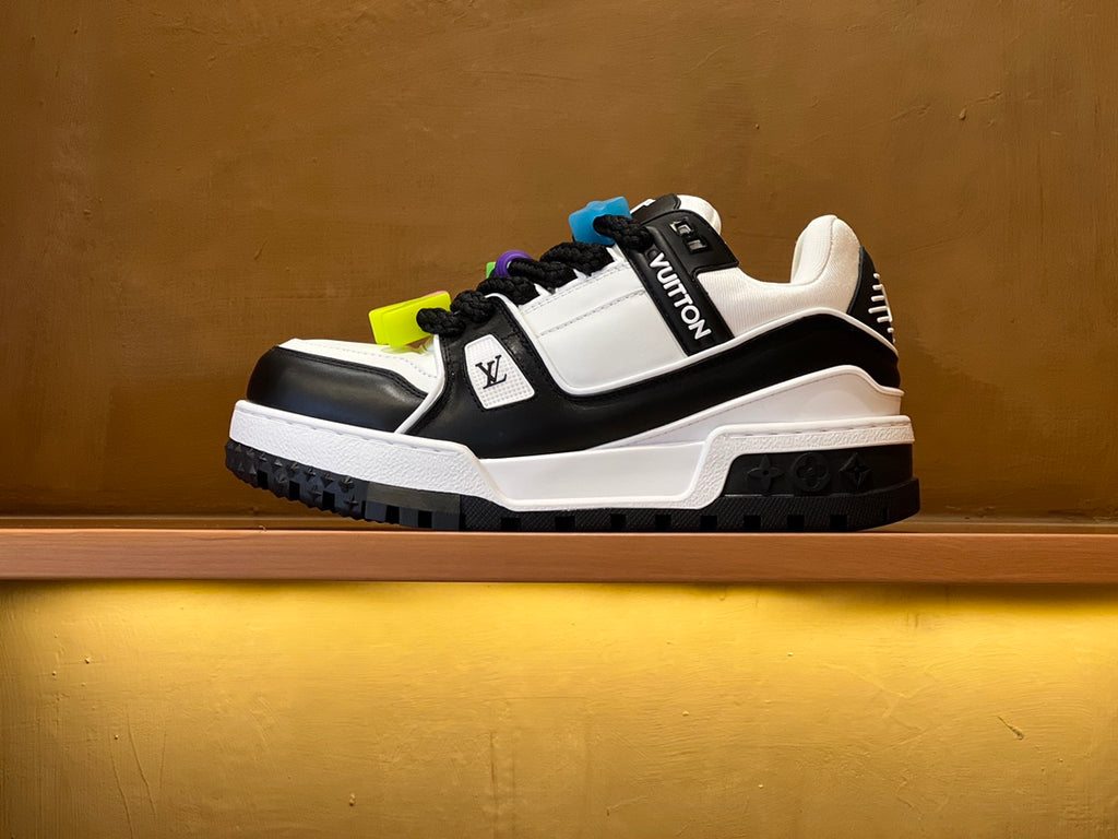 Louis Vuitton trainer sneakers with white and black panels and colorful lace charms