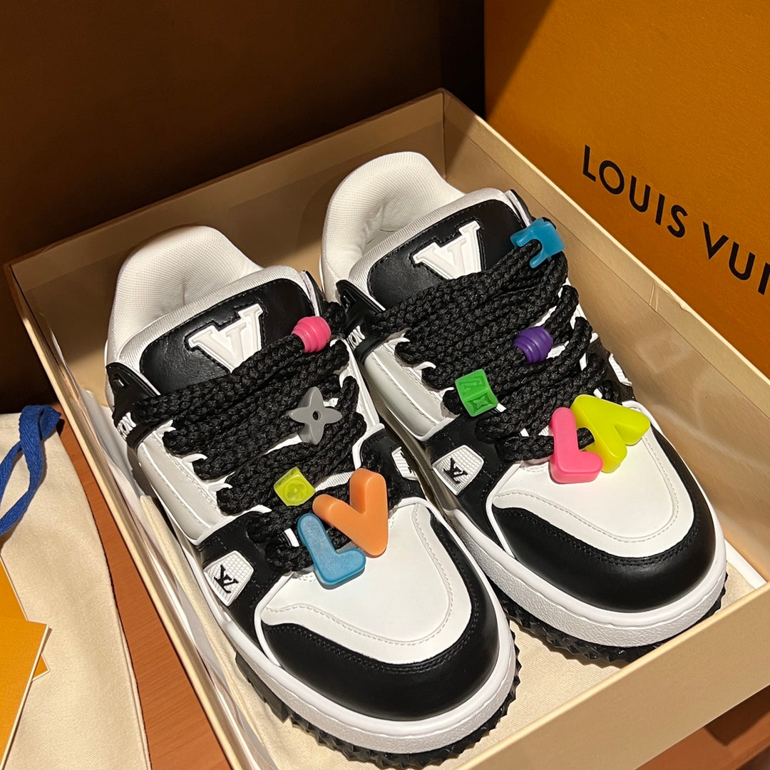 Louis Vuitton trainer sneakers in box, black-and-white uppers with colorful lace beads