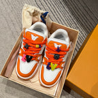 Orange and white Louis Vuitton trainer sneakers with rainbow lace charms in box