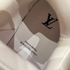 Louis Vuitton shoe box with black LV logo print on light gray packaging