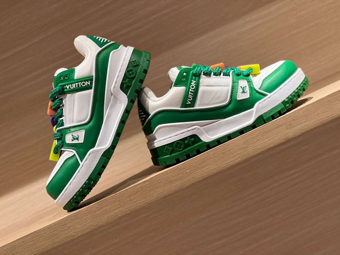 Green-and-white low-top sneakers with LV side patch and colorful lace details