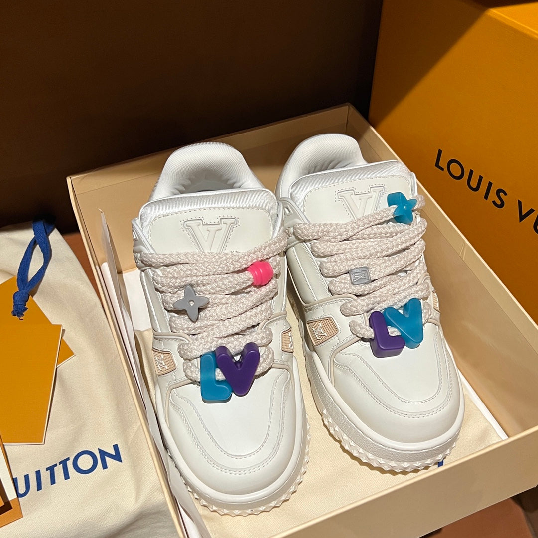 Louis Vuitton trainer shoes pair in box, white uppers with multicolor charm laces