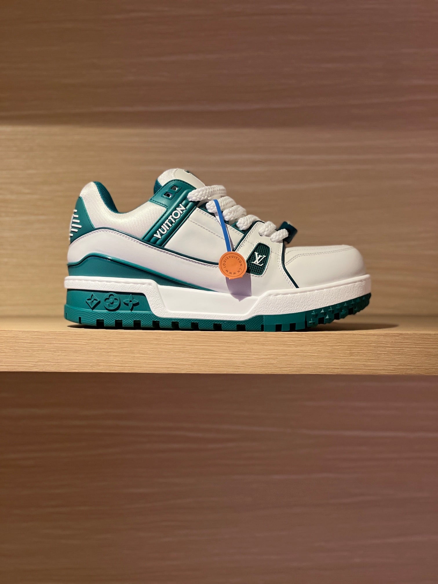 Louis Vuitton trainer sneakers, white leather with teal accents and lace-up style