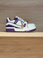 White and purple low-top sneakers with side logo and lace-up closure