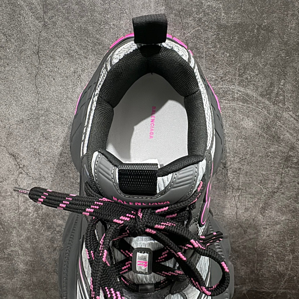 Balenciaga sneaker, interior heel view; black lining with laces and neon pink details