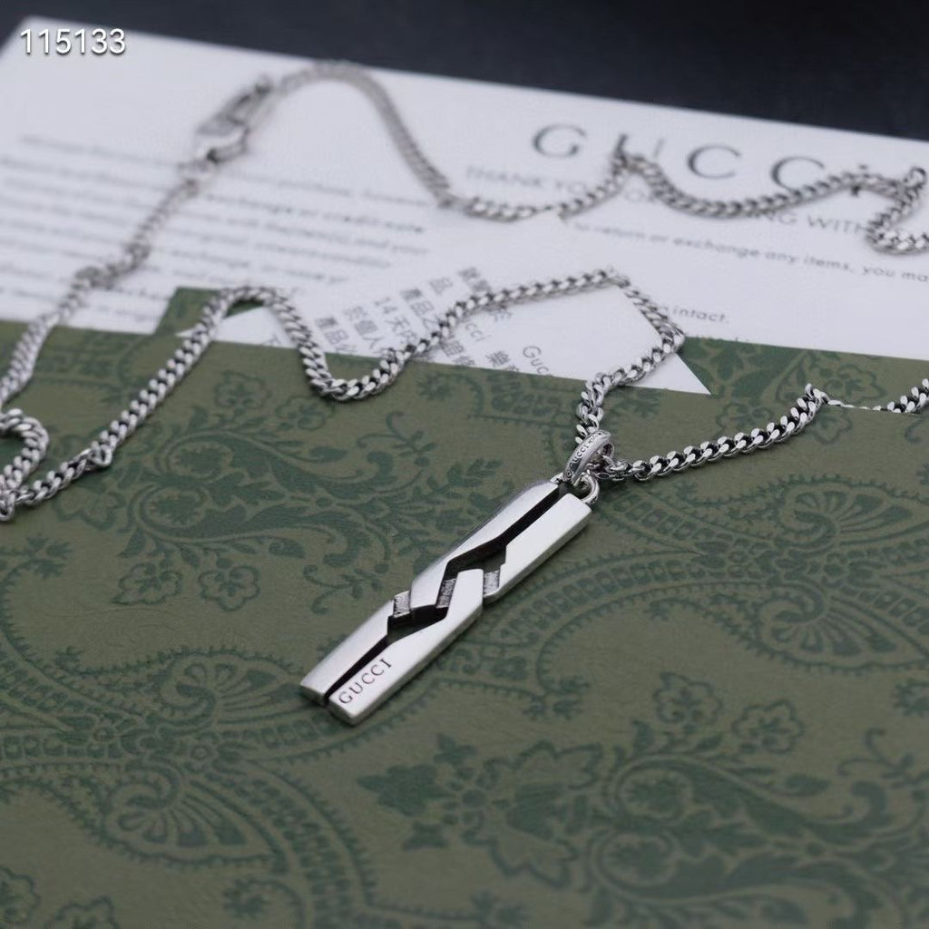 Silver-tone chain necklace with long rectangular pendant