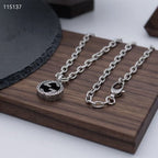 Gucci silver-tone round logo pendant necklace and clasp chain set