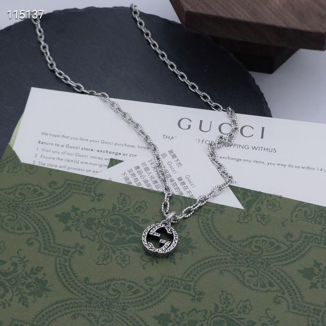 Gucci silver-tone layered chain necklace with round logo pendant