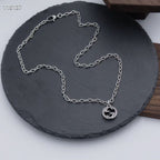 Gucci silver-tone chain necklace with round logo pendant