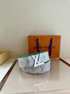 White-and-gray monogram belt with green lining and gold LV buckle