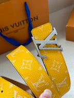 Yellow monogram leather belt with silver LV buckle detail and strap edge