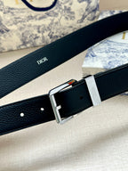 Dark navy leather belt with Dior-embossed strap and silver buckle clasp