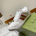 White Gucci unisex sneakers with red green web stripe and laced front