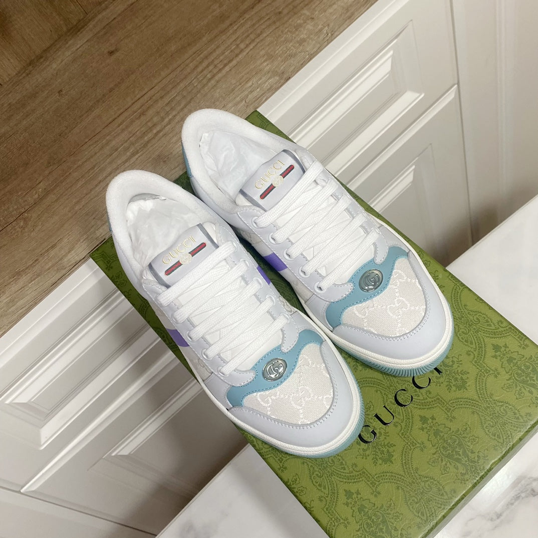 Gucci unisex lace-up sneakers, white with pale blue overlays and purple stripe.