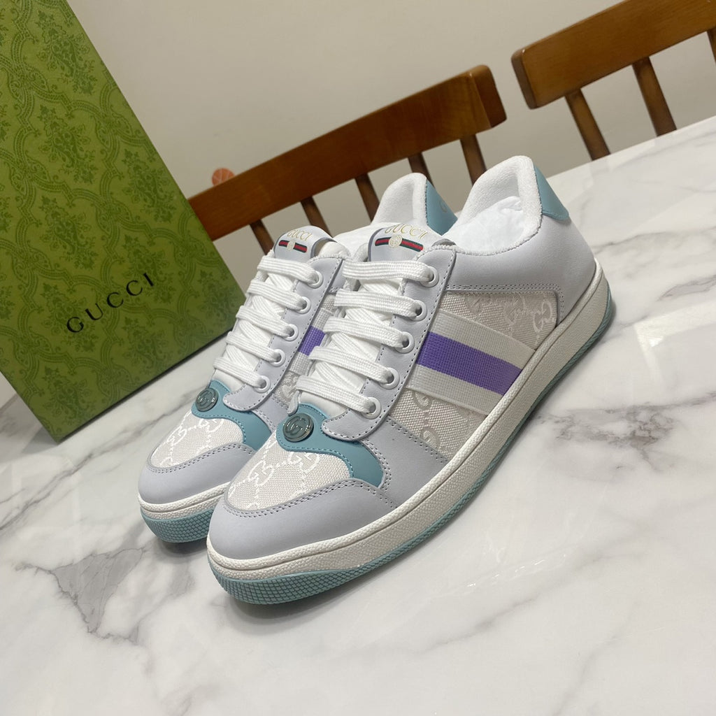 Gucci unisex sneakers in white with purple stripe and teal accents, lace-up.