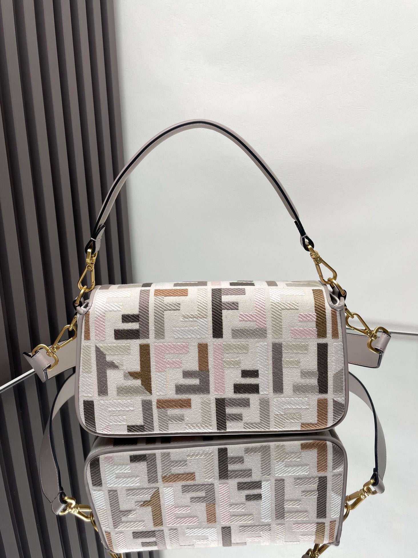 Fendi crossbody bag with F-end monogram flap, gold hardware, taupe strap