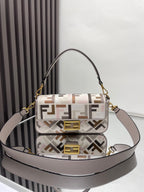 Fendi crossbody bag with F-end monogram, gold hardware, taupe strap