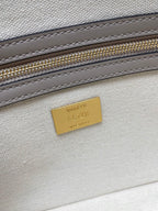 Fendi bag interior tag reading “BAGUETTE” and “FENDI” on light lining