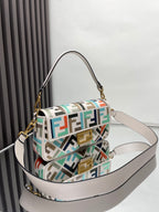 Fendi baguette bag, multicolor FF jacquard, side view with shoulder strap and gold hardware
