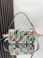 Fendi baguette bag front view, multicolor FF jacquard, gold hardware, shoulder strap