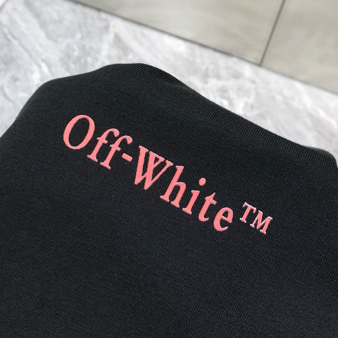 Off-White™ logo text on black T-shirt fabric
