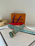 Louis Vuitton belt with mint monogram strap and gold-tone buckle, red interior
