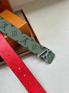 Louis Vuitton belt with textured red strap and silver-tone buckle