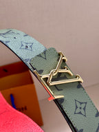 Louis Vuitton belt close-up with mint monogram strap and gold-tone buckle