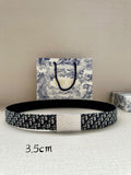 Dior belt with black and white patterned strap and rectangular silver-toned buckle
