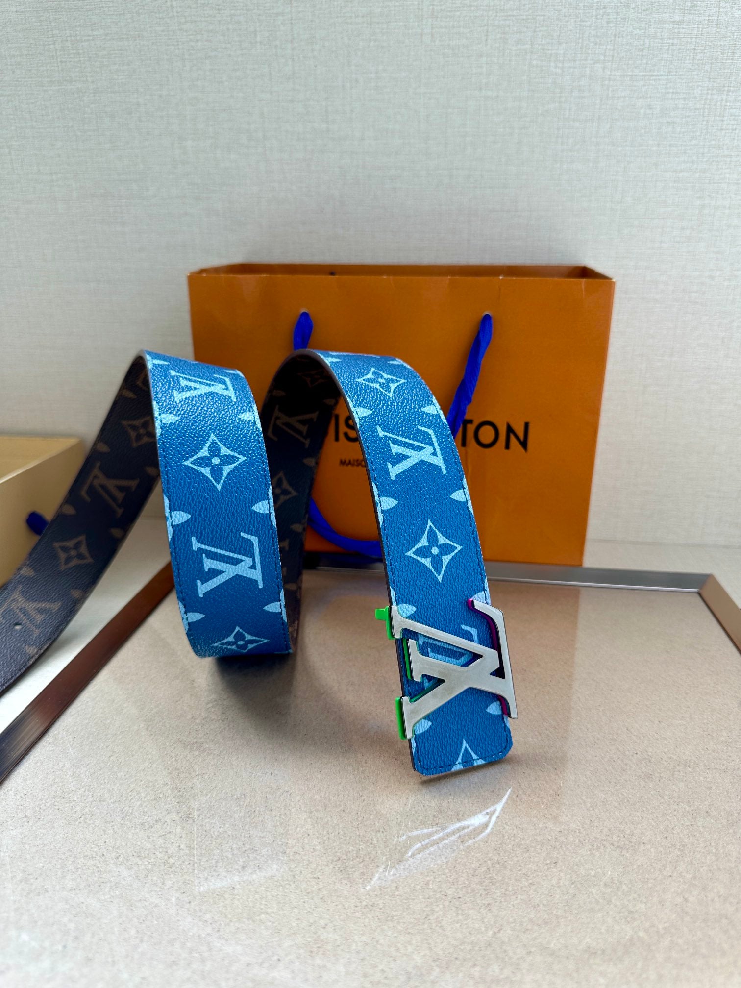 Louis Vuitton blue monogram belt with silver buckle and adjustable strap ends