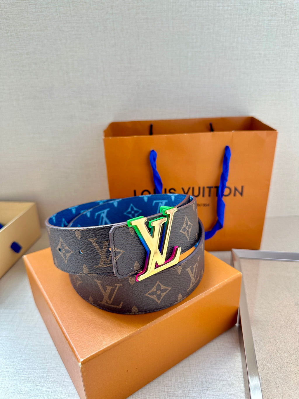 Louis Vuitton monogram belt, blue strap with LV multicolor buckle