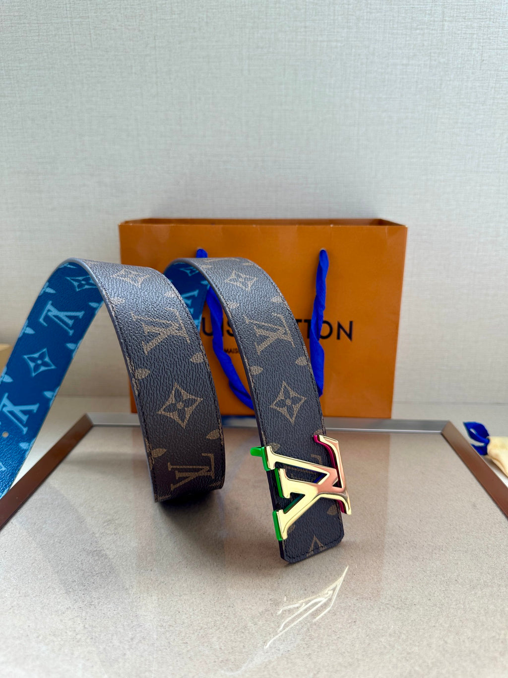 Louis Vuitton monogram belt, blue strap, green and purple LV buckle