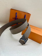 Gray leather belt with large LV buckle and adjustable holes
