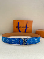 Blue monogram belt with metal buckle and tan keeper