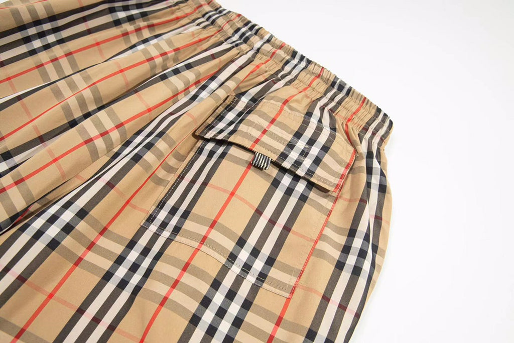 Burberry plaid shorts with side flap pocket and button tab detail