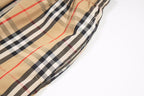 Burberry plaid shorts side seam and drawstring hem close-up