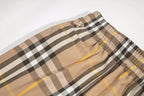 Plaid shorts with elastic waistband and drawstring cord, beige black yellow check