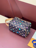 Louis Vuitton monogram vanity bag with zipper and multicolor star pattern, tan strap