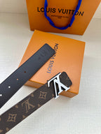 Louis Vuitton monogram belt with LV buckle and perforated adjustment holes
