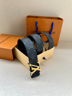 Dark monogram belt with silver-tone LV buckle and textured leather strap