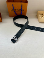 Dark monogram belt with oversized silver-tone LV buckle