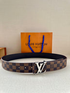 Louis Vuitton damier belt with gold-tone LV buckle, dark navy interior and stitching