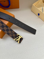 Louis Vuitton belt strap end with dark leather, perforation holes, and gold-tone buckle