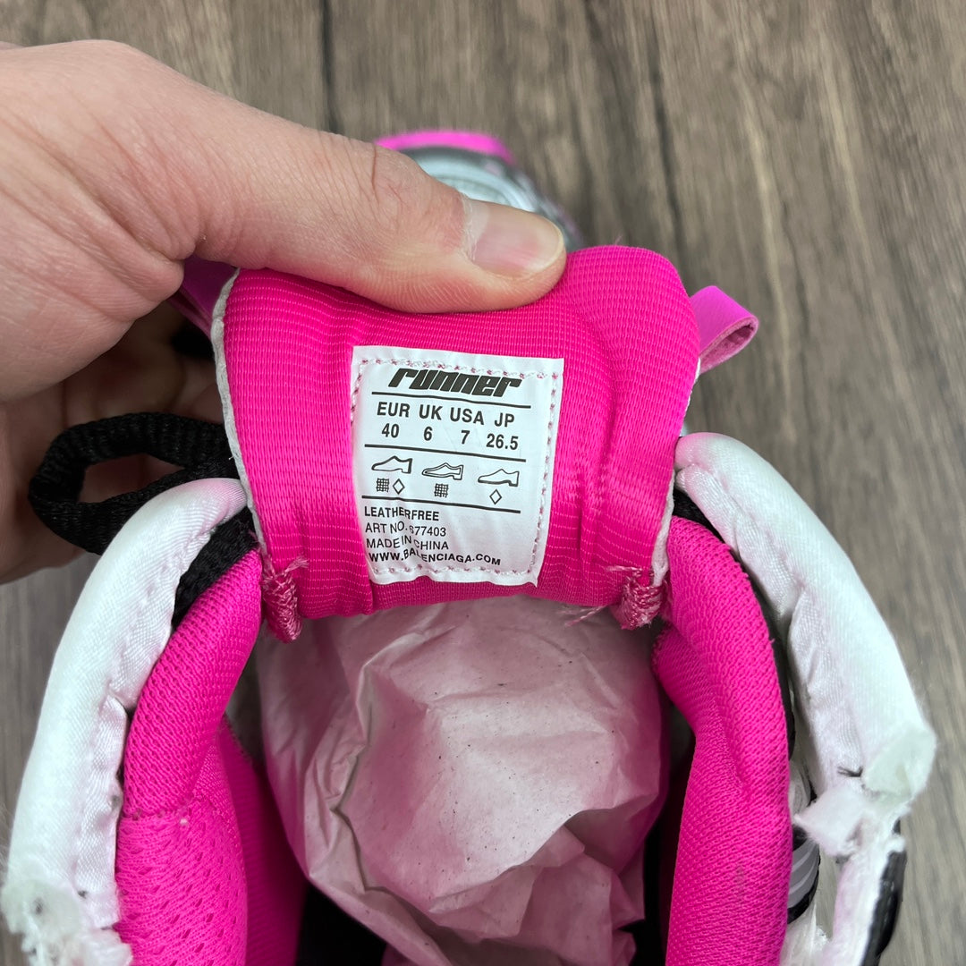 Unisex sneaker interior view with bright pink lining and size label, size 40