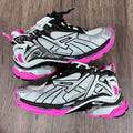 Unisex Balenciaga sneakers in silver with black panels and neon pink soles